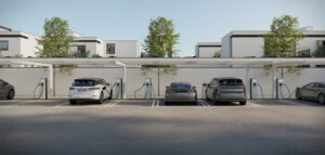 En modern laddstation med lastbalansering installerad i en bostadsrättsförening. Flera bilar laddas samtidigt, och systemet optimerar energifördelningen.